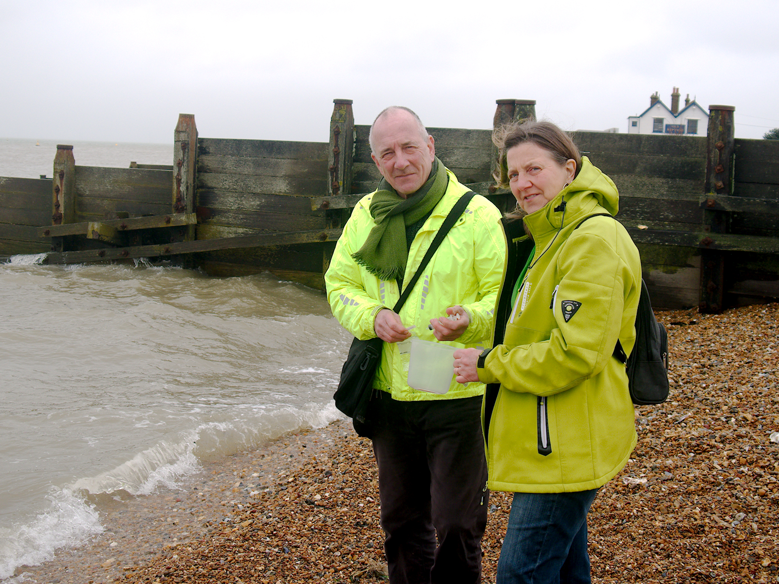 Andrew Harvey and councillor Clare Turnbull undertaking water quality testing in the sea at Whitstable